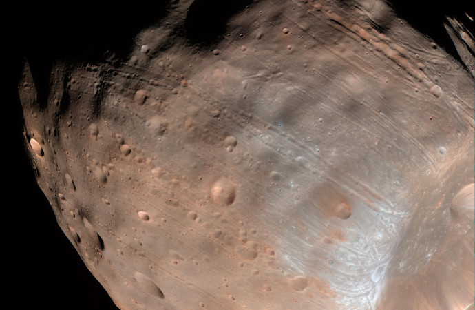 Mars moons may have formed after collision with Pluto-like world