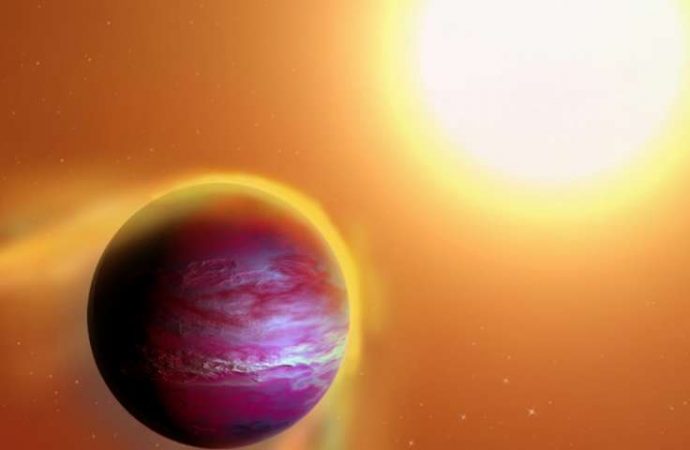 Young star appears to be ripping away layers of close-orbiting ‘hot Jupiter’