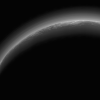 What Is This Weird Glowing Spot Hovering Over Pluto?