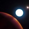 Astronomers spy giant planet, three stars in odd celestial ballet