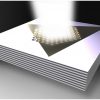 Photonic hypercrystals drastically enhance light emission in 2D materials
