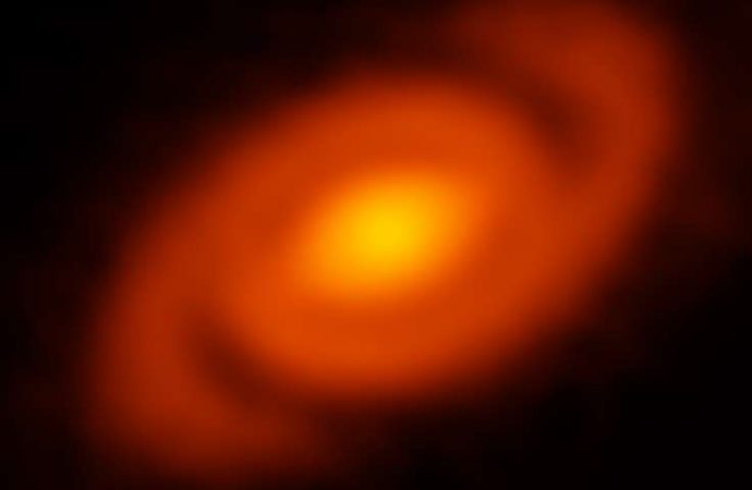 Spiral arms: Protoplanetary disk around a young star exhibits spiral structure