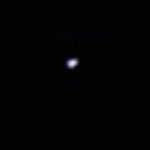 Wisconsin witness videotapes hovering UFO