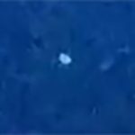 Canadian witness videotapes hovering UFO