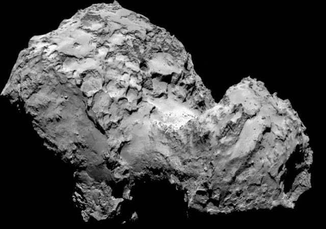 Does the organic material of comets predate our solar system?