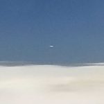 UFO photographed with cell phone by airline passenger