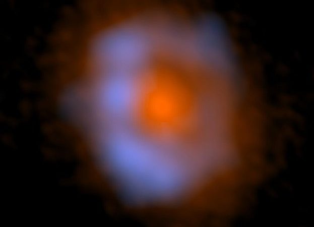 Retreating snow line reveals organic molecules around young star