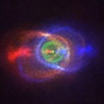 Spectacular rainbow cloud in space spawned by cosmic showdown between stars