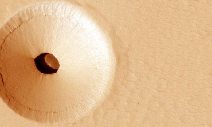What Is The Deal With This Weird Hole on Mars?