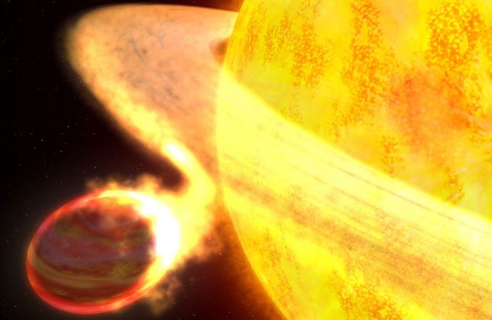 Red giant stars that eat planets might shine less brightly