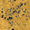 Flat spots on Saturn’s moon Titan may be the floors of ancient lake beds