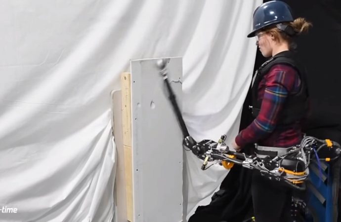 Watch a wearable robotic arm punch through a wall