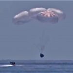 Nasa astronauts aboard SpaceX capsule make first splashdown in 45 years