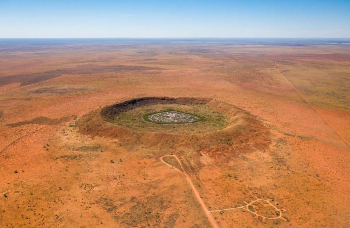 Meteorite crater discovered while drilling for gold in outback WA estimated to be 100 million years old
