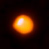 Betelgeuse is Smaller and Closer to Earth than Previously Thought