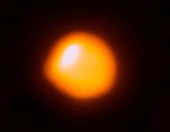 Betelgeuse is Smaller and Closer to Earth than Previously Thought