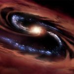 Galaxy survives a ravenous black hole by birthing 100 stars a year