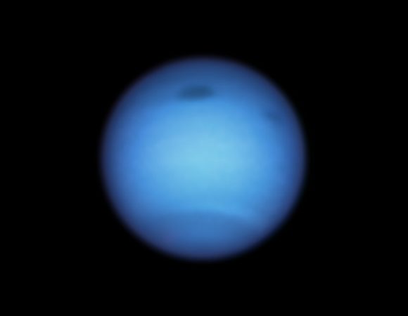 Hubble Monitors Weird Dark Vortex on Neptune